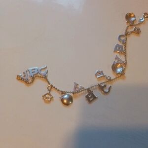 Sterling silver Adc's Charm bracelet